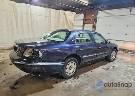 1999 Lincoln Continental z USA, uszkodzony, nr VIN 1LNHM97V3XY651210